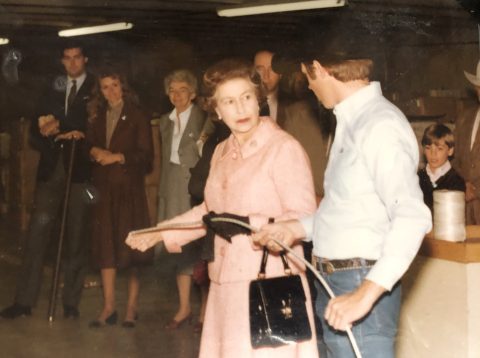 Queen Elizabeth shopping at King Ropes and Saddlery; attributed to the AP Press