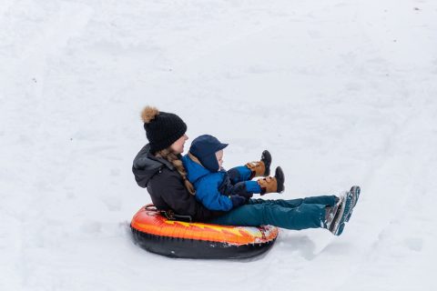 Sledding at the Trail End State Historic Site